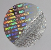 Hologrammfolie, bei Ablöseversuchen wird das Etikett zerstört